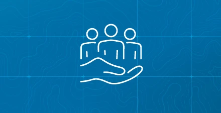 Hand holding three person outline logos.