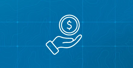 Hand holding circle coin with dollar sign inside.