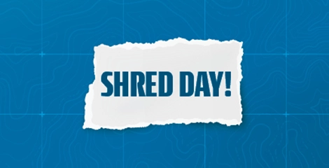 Shred Day heading over blue background.
