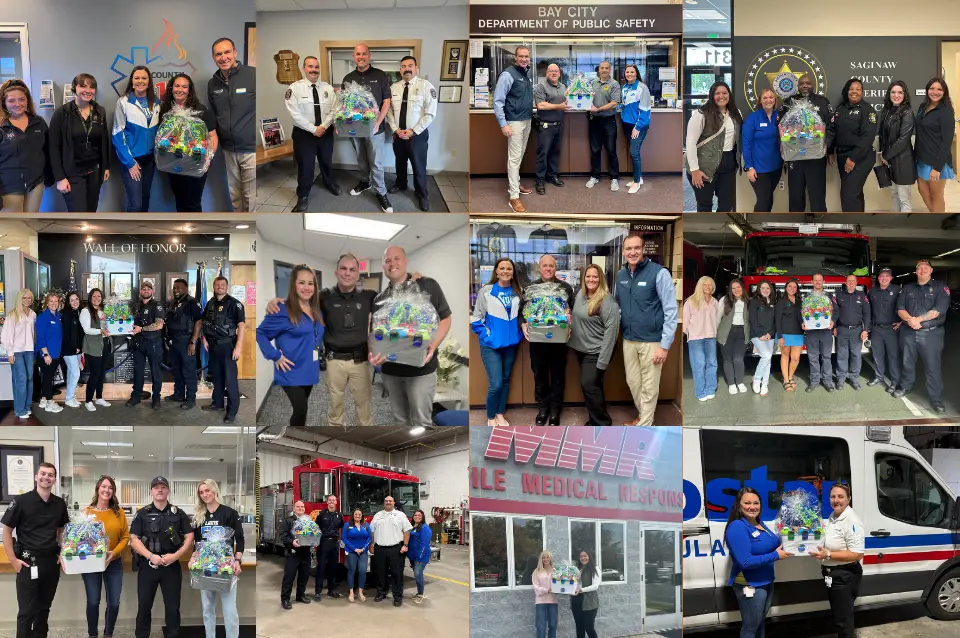 Wildfire employees deliver baskets to first responders for CU Kind Day.