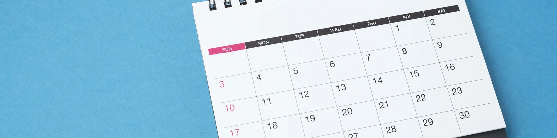 Open calendar on a blue background.