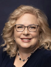 Headshot of Wildfire's Midland mortgage specialist Amy Flood.