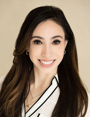 Headshot of Wildfire Financial Group Program Coordinator Amber Uribe.